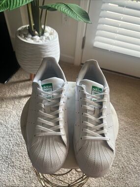 adidas White Sneakers with Green Tongue Logo